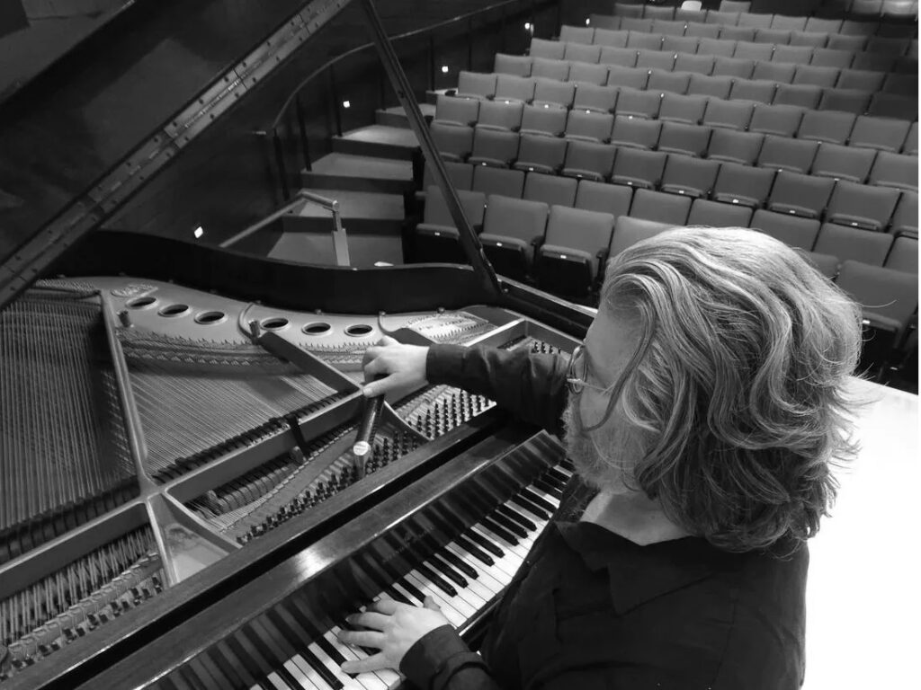 Master Piano Technician Joe Kemple tuning a piano in Cottleville, MO